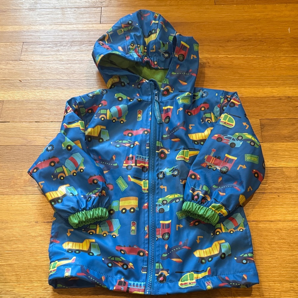 Stephen Joseph Blue Hooded Rain Jacket with Colorful Vehicle Print